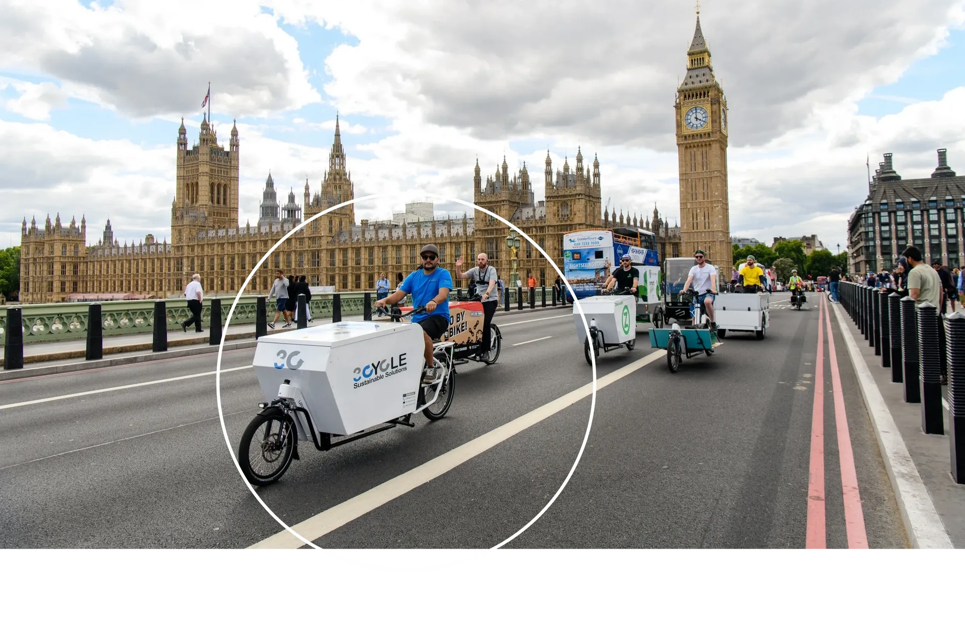 3Cycle cargo bikes riding past the Houses of Parliament and Big Ben in London