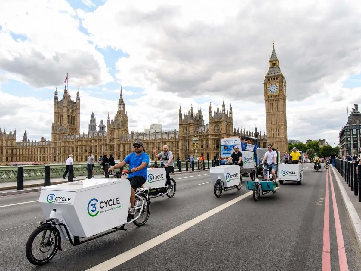 3Cycle zero-emission cargo bikes crossing Westminster Bridge, London